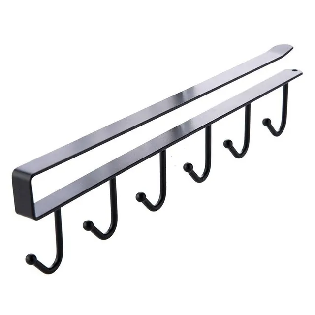 Hinged holder for kitchen utensils