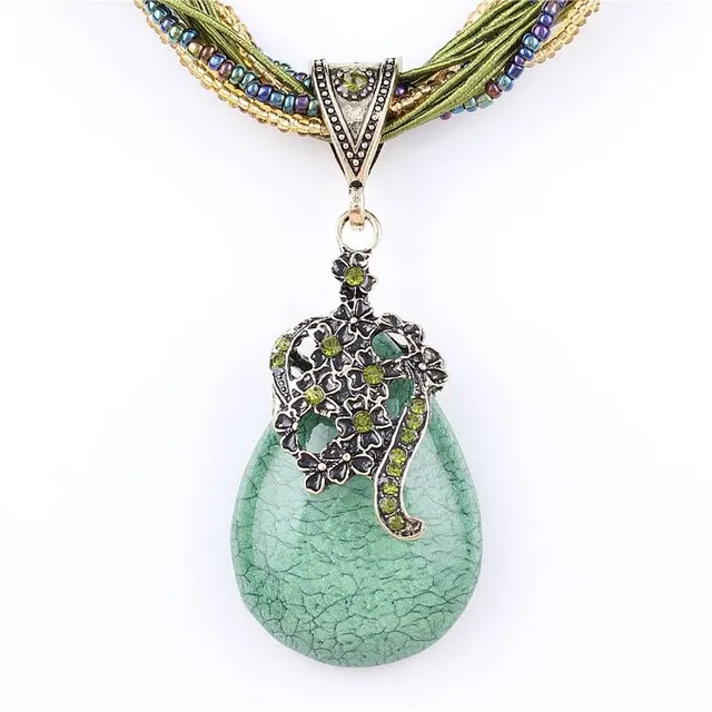 Women's beaded necklace with peacock