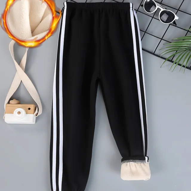 Boys sweatpants for spring and autumn with soft fleece, stripes on the sides and a comfortable cut - ideal for outdoor activities.