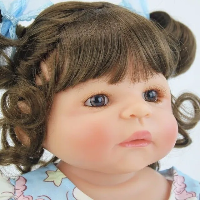 Realistic doll with curly hair 55 cm