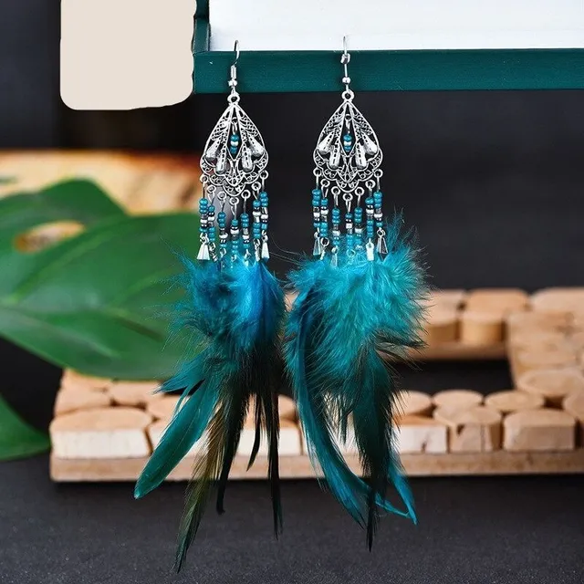 Women's dangle earrings with feathers