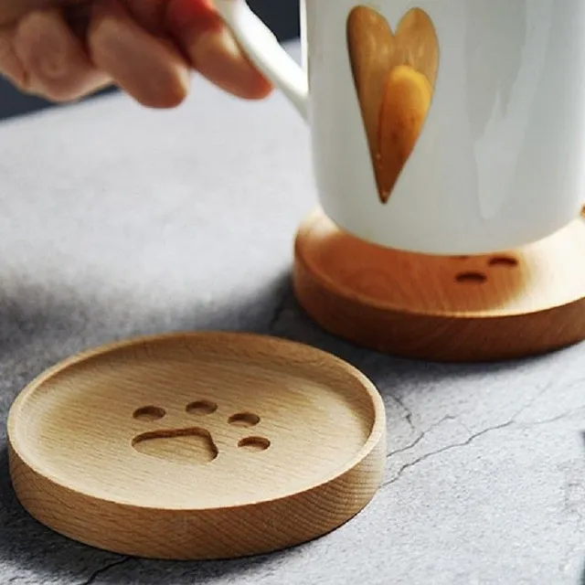 Wooden coaster with paw