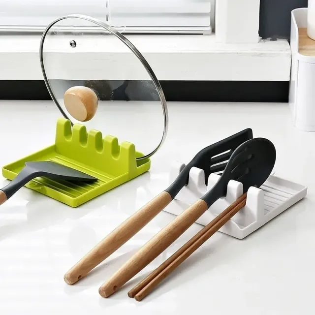 Holder for kitchen utensils with anti-slip pad