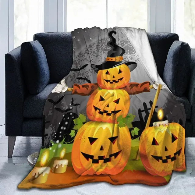 Autumn flannel blanket with a motif of pumpkins and leaves for sofa, bed or couch