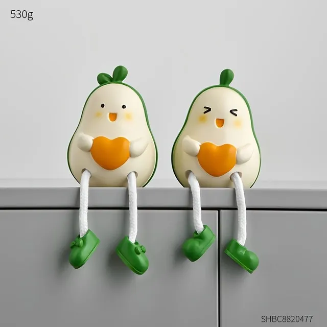 Decorative pair of avocado dolls made from resin