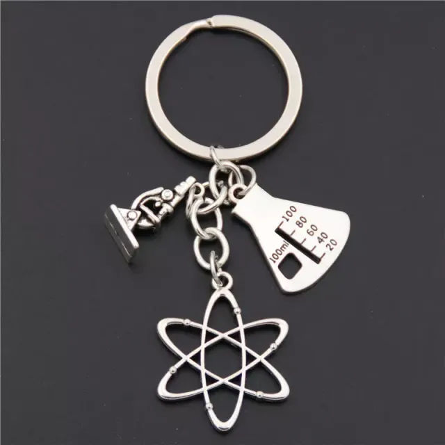 Microscopic key with pendant of biological and chemical words