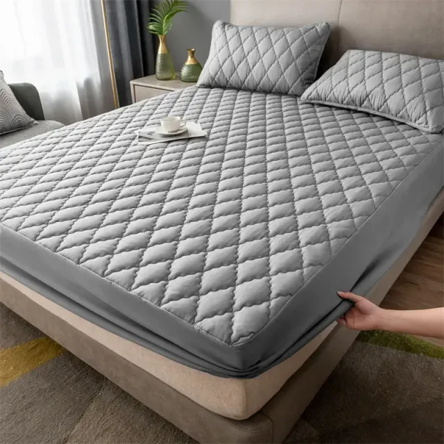 Waterproof mattress protector with rough padding and pleasant household fabric