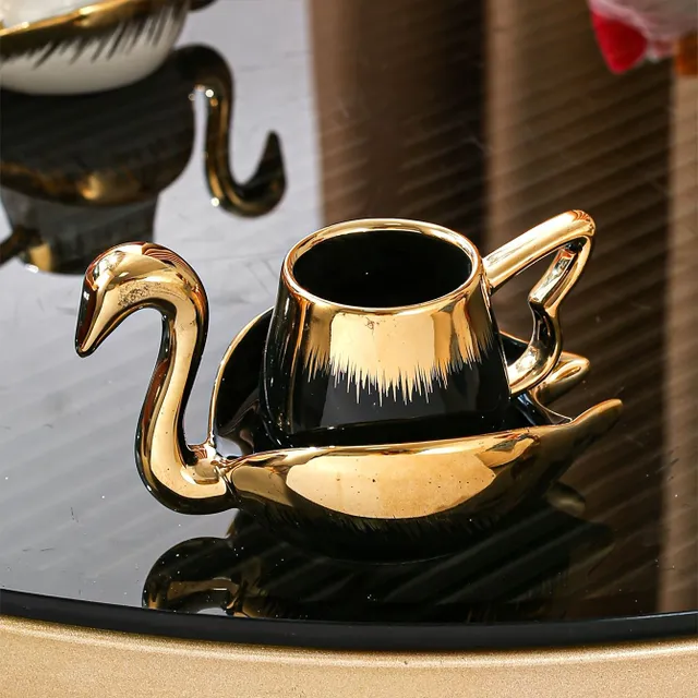 Elegant cup and saucer with swan, ceramic cup for coffee and saucer, drink with golden edge for breakfast, tea party, afternoon tea, home, garden, restaurant and more, drinks for summer and winter