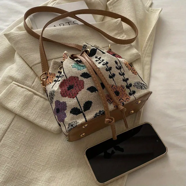 Elegant mini crossbody purse with floral motif