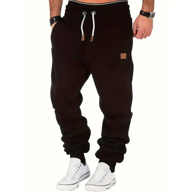 Men's sweatpants with drawstring, pockets and jogger cut for autumn/winter - for running and jogging