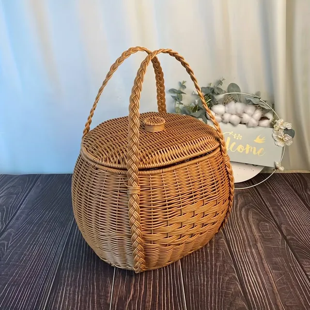 Picnic basket of rustic appearance made of knitted plastic with handles - durable and light for camping and meeting