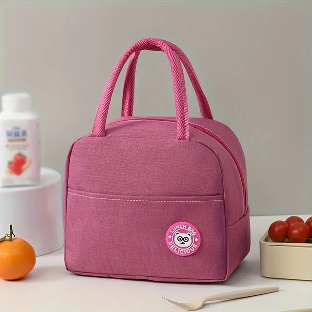 Practical insulated lunch bag with cheerful motif, handles and thermal insulation