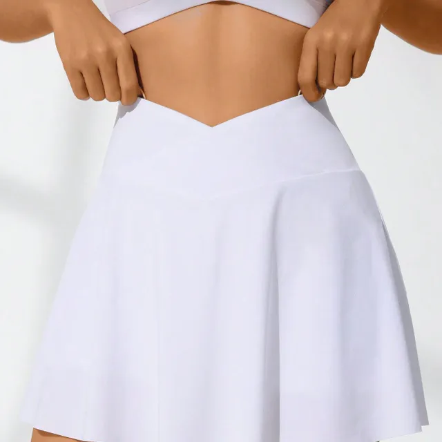 Tennis skirt with a wide ribbon in the waist and a volley line for active movement