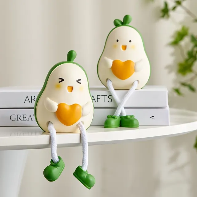 Decorative pair of avocado dolls made from resin