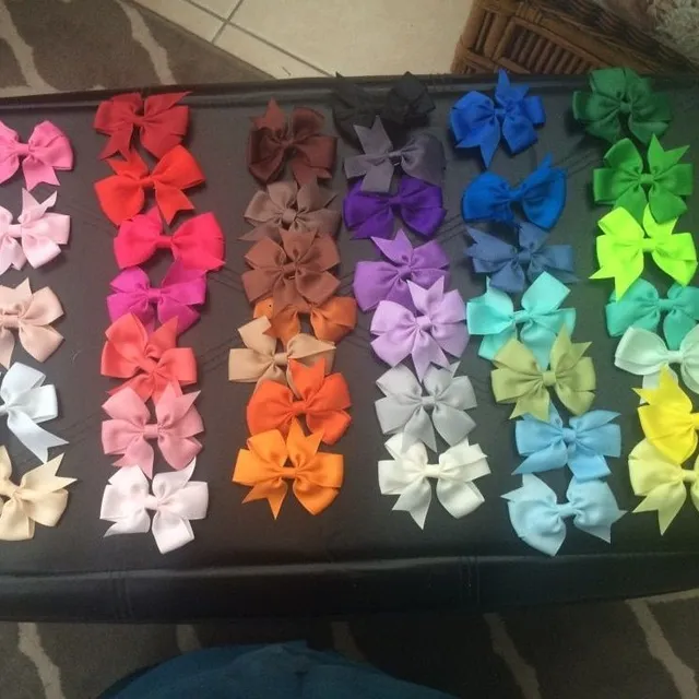 Set of coloured bows with rack