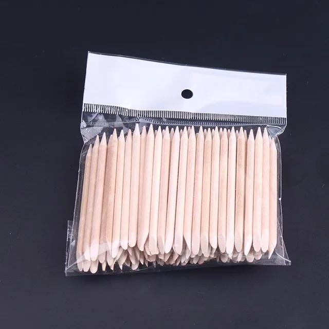 Set of wooden sticks to remove the nail skin