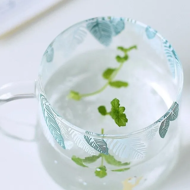 Glass mug with animals