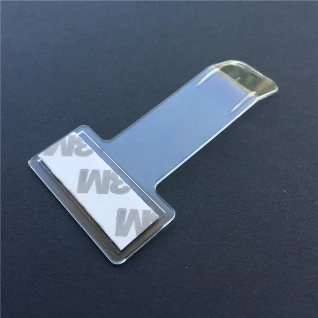 Adhesive clip for windshield