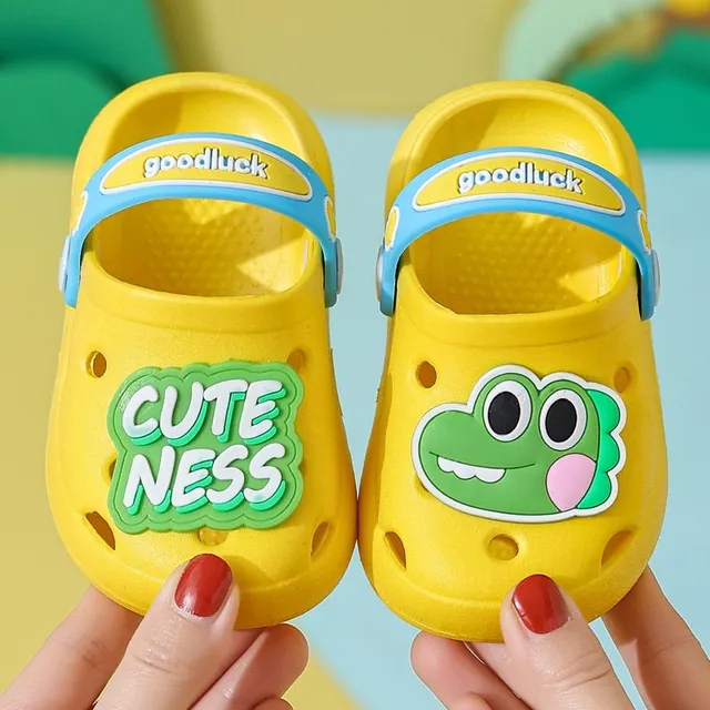 Children's perforated foam slippers with cute accessory