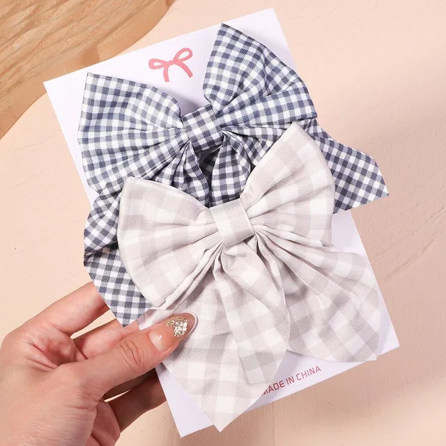 Cute modern baby hair clip with perfect bow motif - more variants