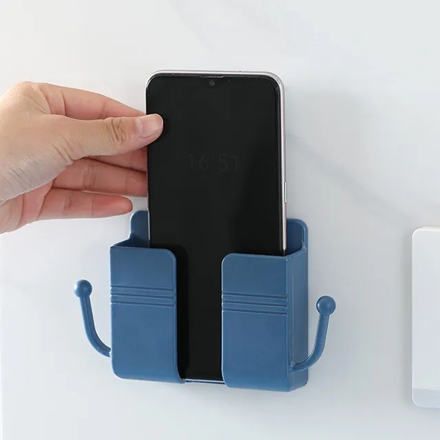 Wall holder of mobile phone with hole for cable and hooks