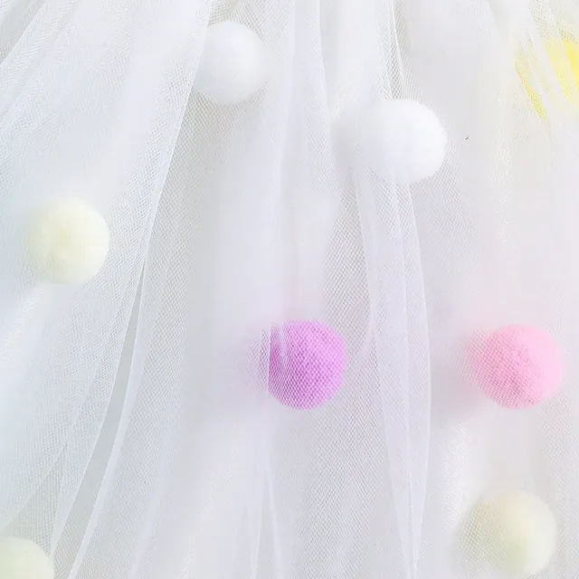 Girl's tutu skirt in tulle with colourful plush balls