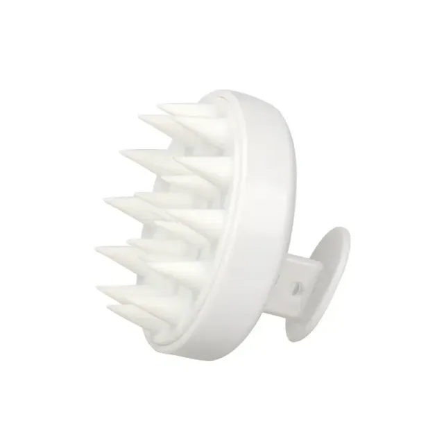 Special sicon massage brush for application of oil into the hair skin and for their faster growth