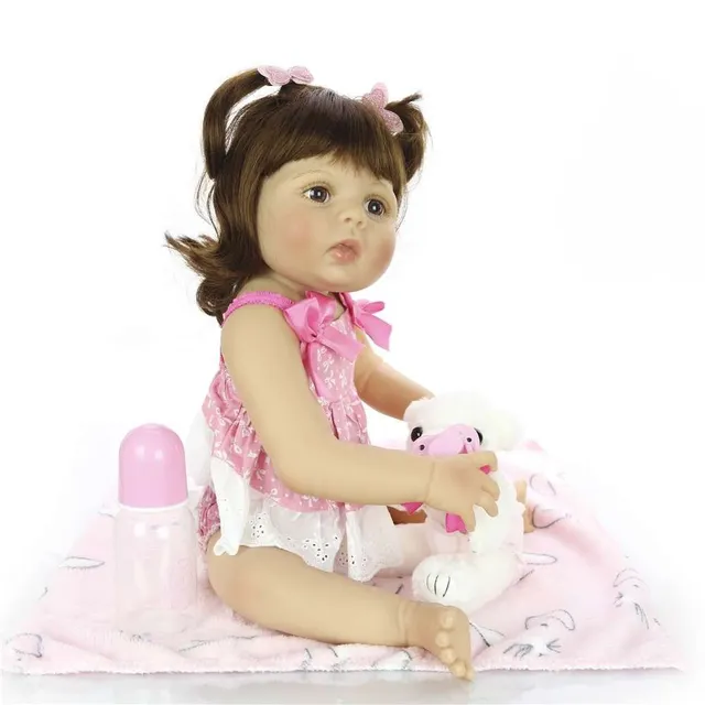 Realistic doll with accessories 57 cm