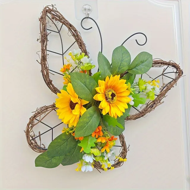 Spring wreath with butterflies and sunflowers on the door