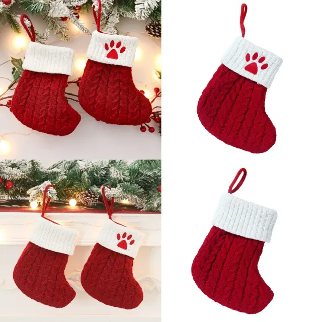 Cute stocking with Christmas motifs and knitted paw pattern