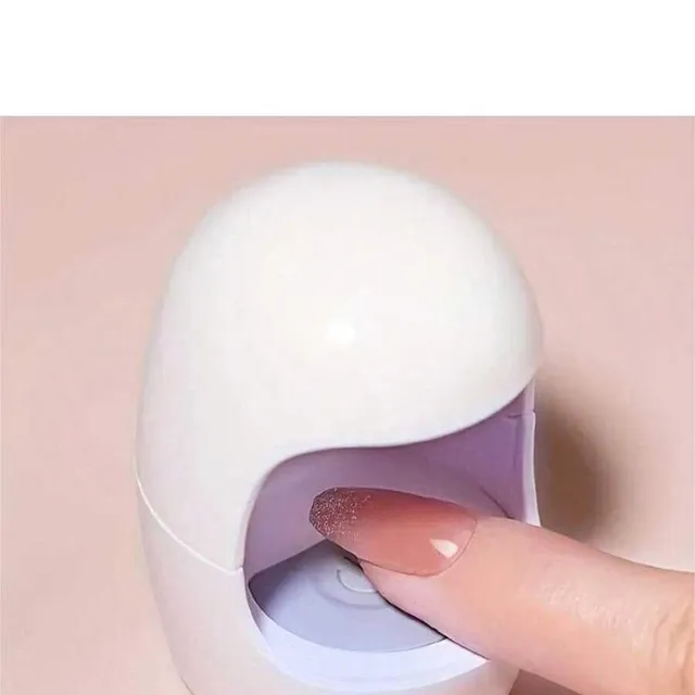 Mini UV/LED gel nail lamp with quick curing for home manicure