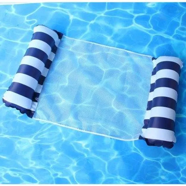 Foldable inflatable lounger for water