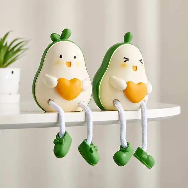 Decorative pair of avocado dolls made from resin