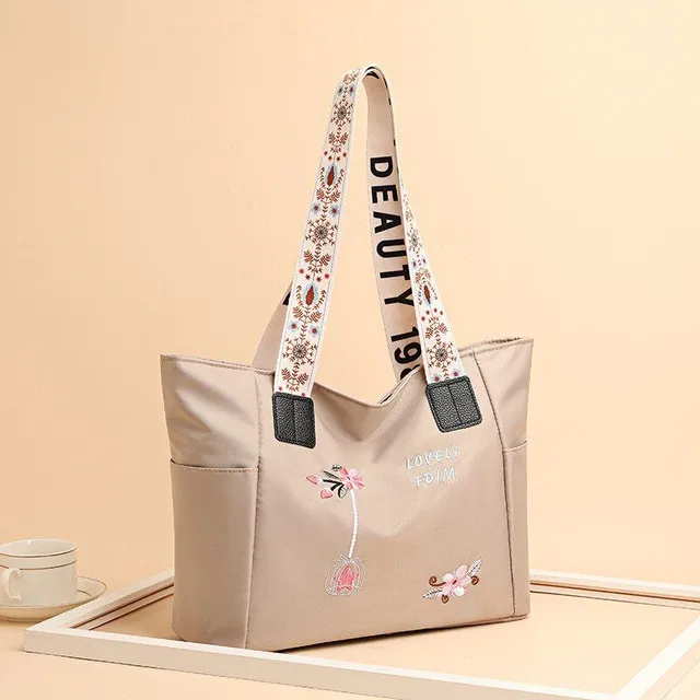 Women's fashion shoulder bag with simple flower print