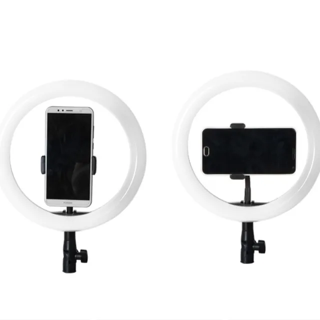 Circular photo light with tripod and phone holder