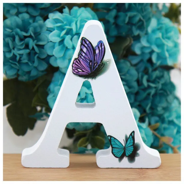 Decorative wooden letter with butterflies