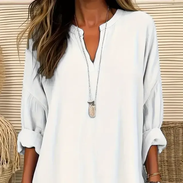 Women's leisure tunic with long sleeve and neckline to V in excessive size