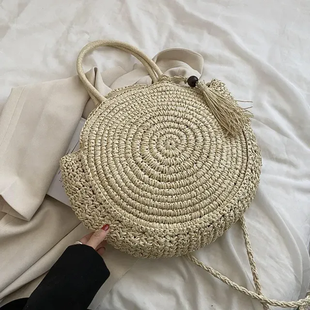 Summer round straw bag with holes in boho style for women