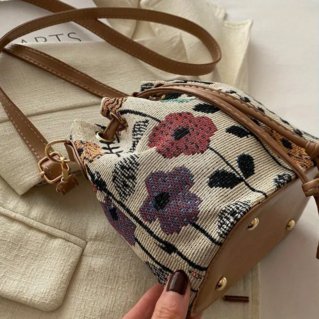 Elegant mini crossbody purse with floral motif