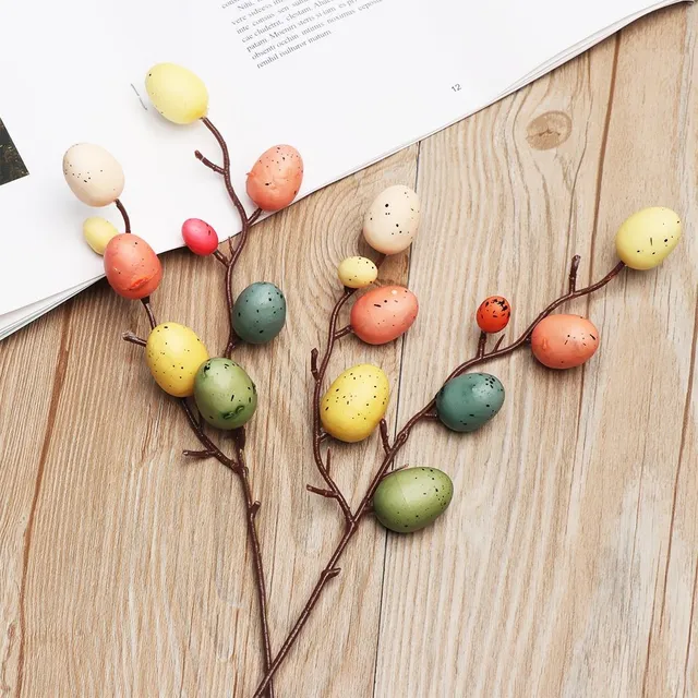 Easter decorative branch with artificial coloured eggs