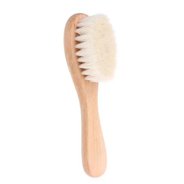 Brosse pour les premiers cheveux de bébé