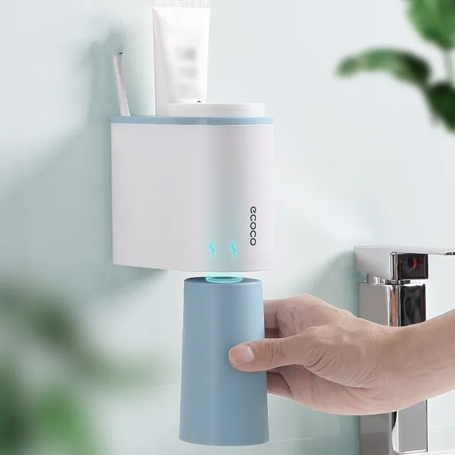 Toothpaste dispenser with toothbrush holder and paste