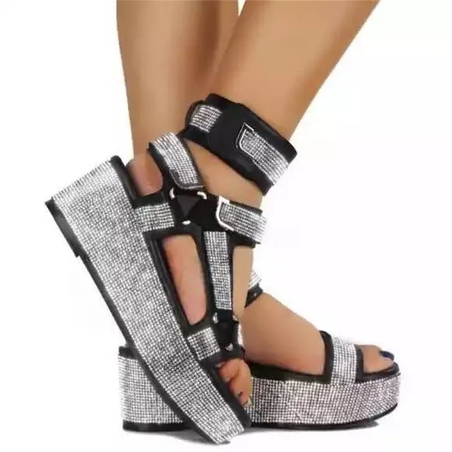 Summer strap sandals decorated with rhinestones on a high platform