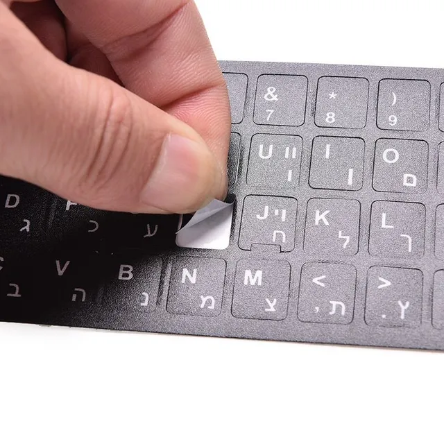 Stick-on letters on the keyboard