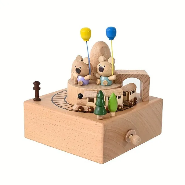 Wooden music box with rotating bears and train