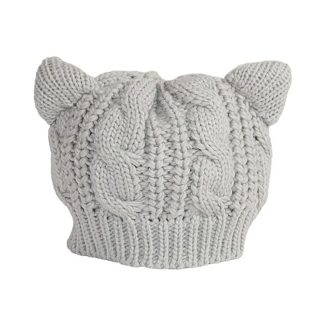 Women's winter knitted hat with ears