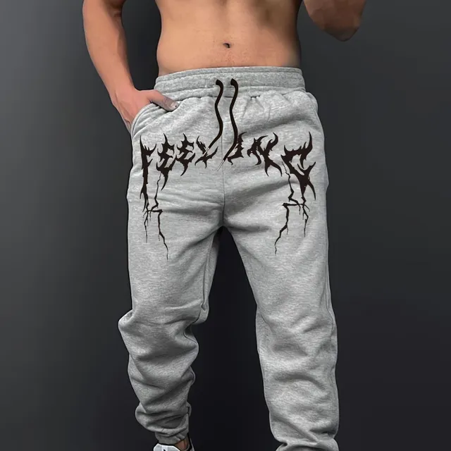 Men's streetwear track pants with print and drawstring waist, ideal for outdoor sports