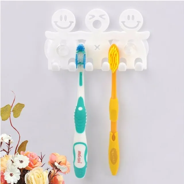 Wall bracket for toothbrushes