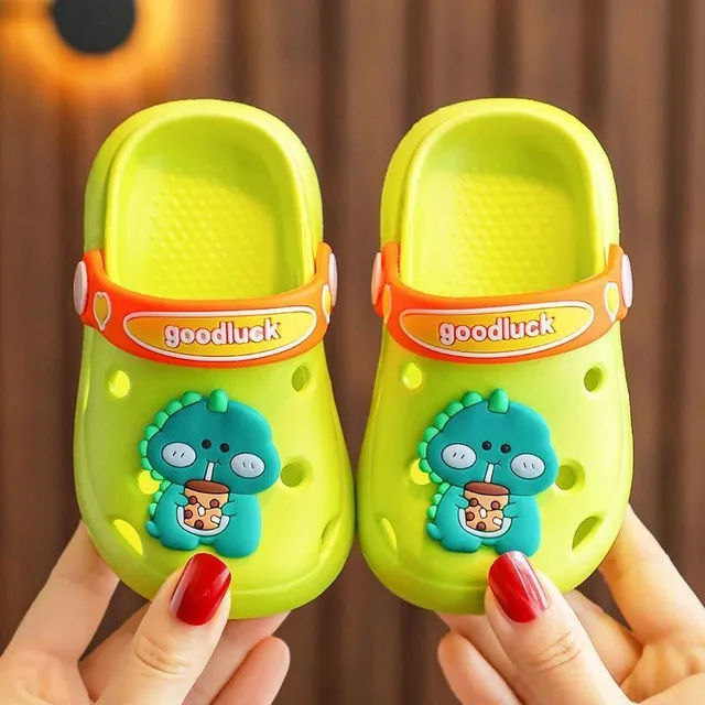 Children's perforated foam slippers with cute accessory