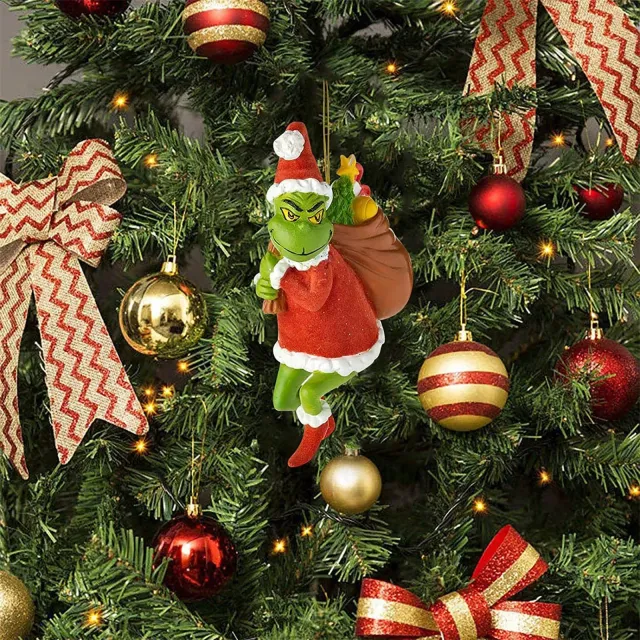 Christmas decoration of the green Grinch to hang on the Christmas tree - different variants